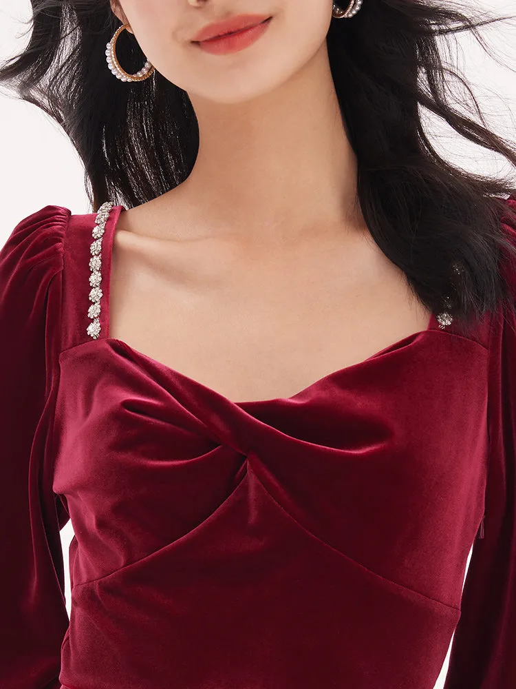 Sure, here is an optimized title for the product with modifiers:

Luxe Red Velvet Twist-Front Midi Dress - Elegant Evening Wear

This title highlights the luxurious material, the twist-front design, and the length of the dress, while also indicating its suitability for elegant events.